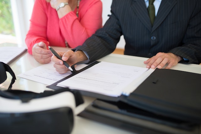 two people going over paperwork